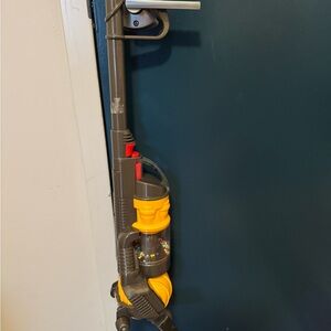 Yellow and Gray Toy Dyson Vacuum Cleaner